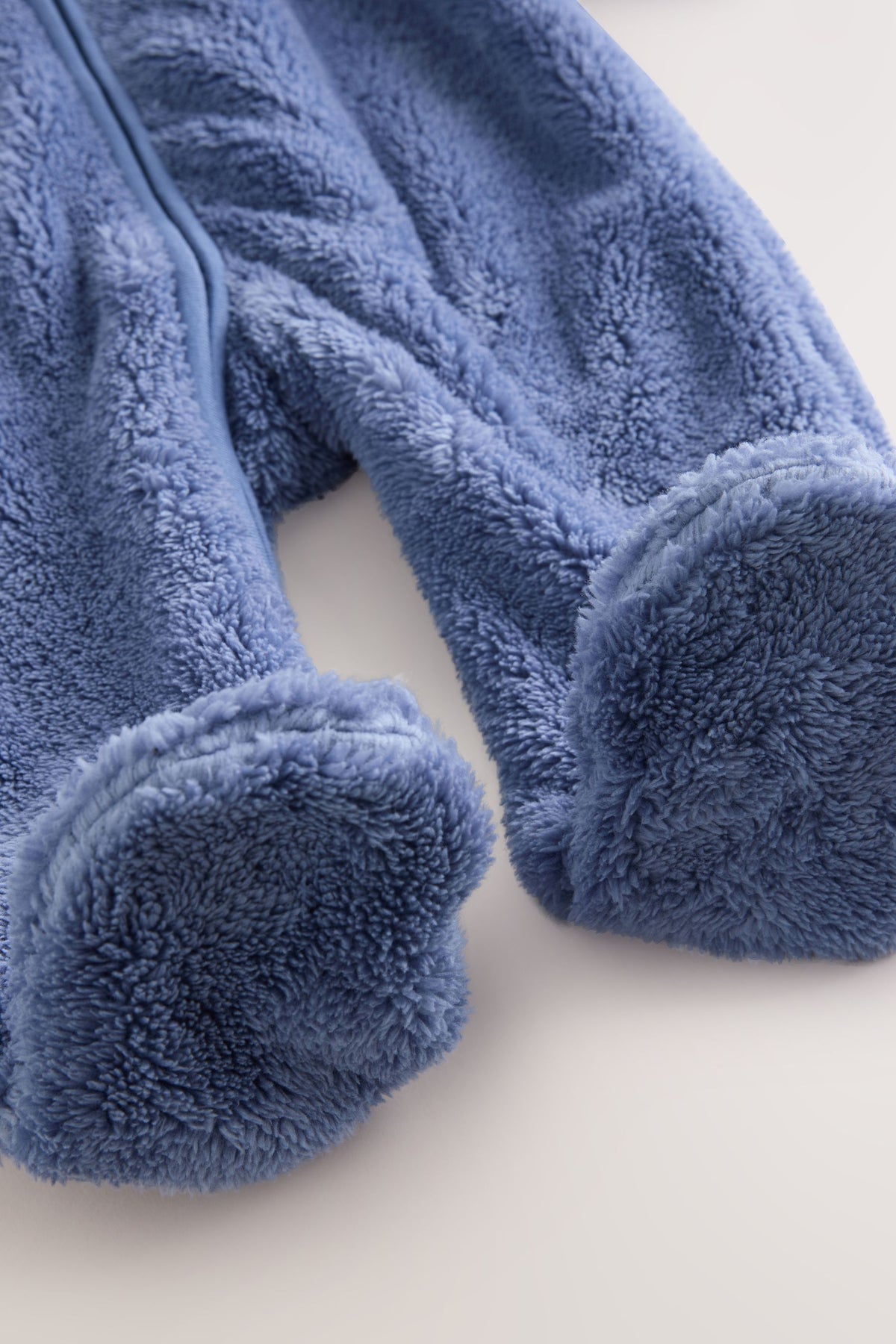 Combinezon fleece pentru bebeluși – bleumarin, NEXT