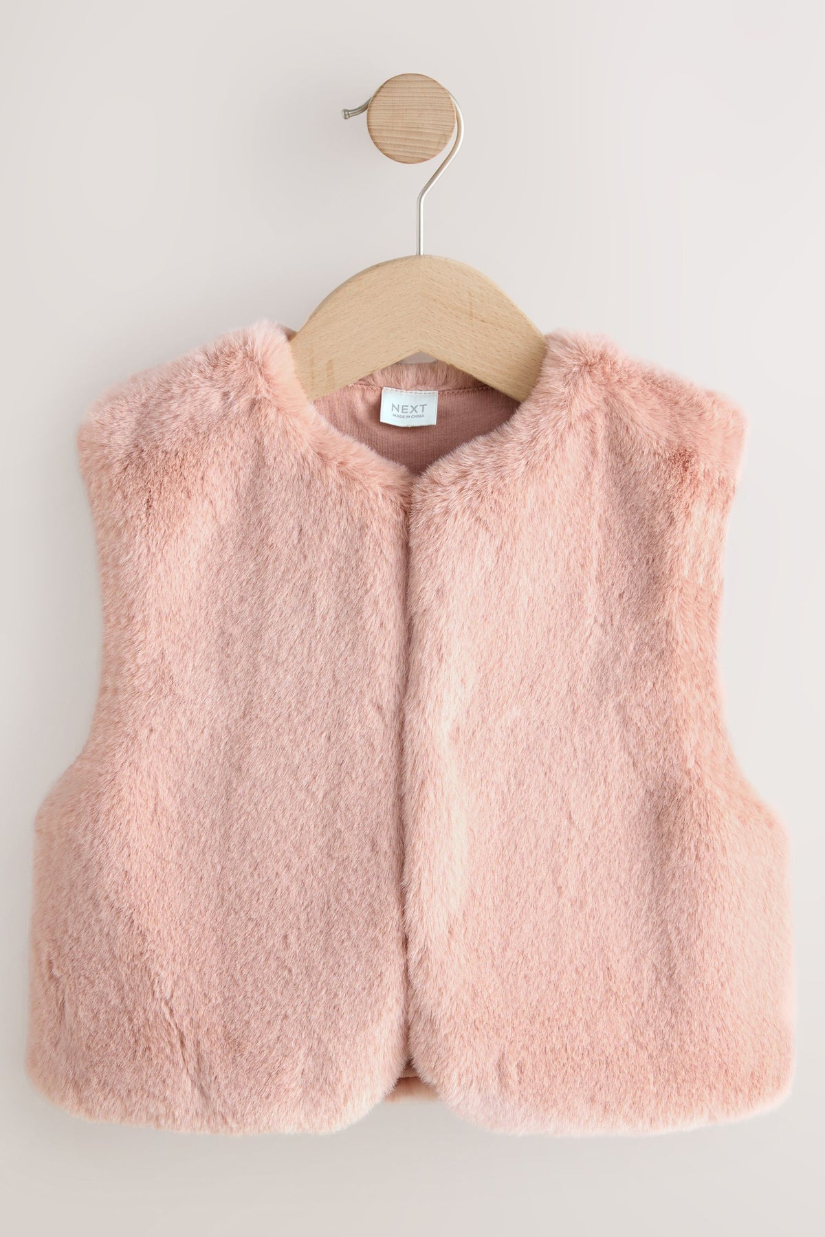 Vestă din faux fur – roz, fete, 3-6 luni - 6-7 ani, NEXT