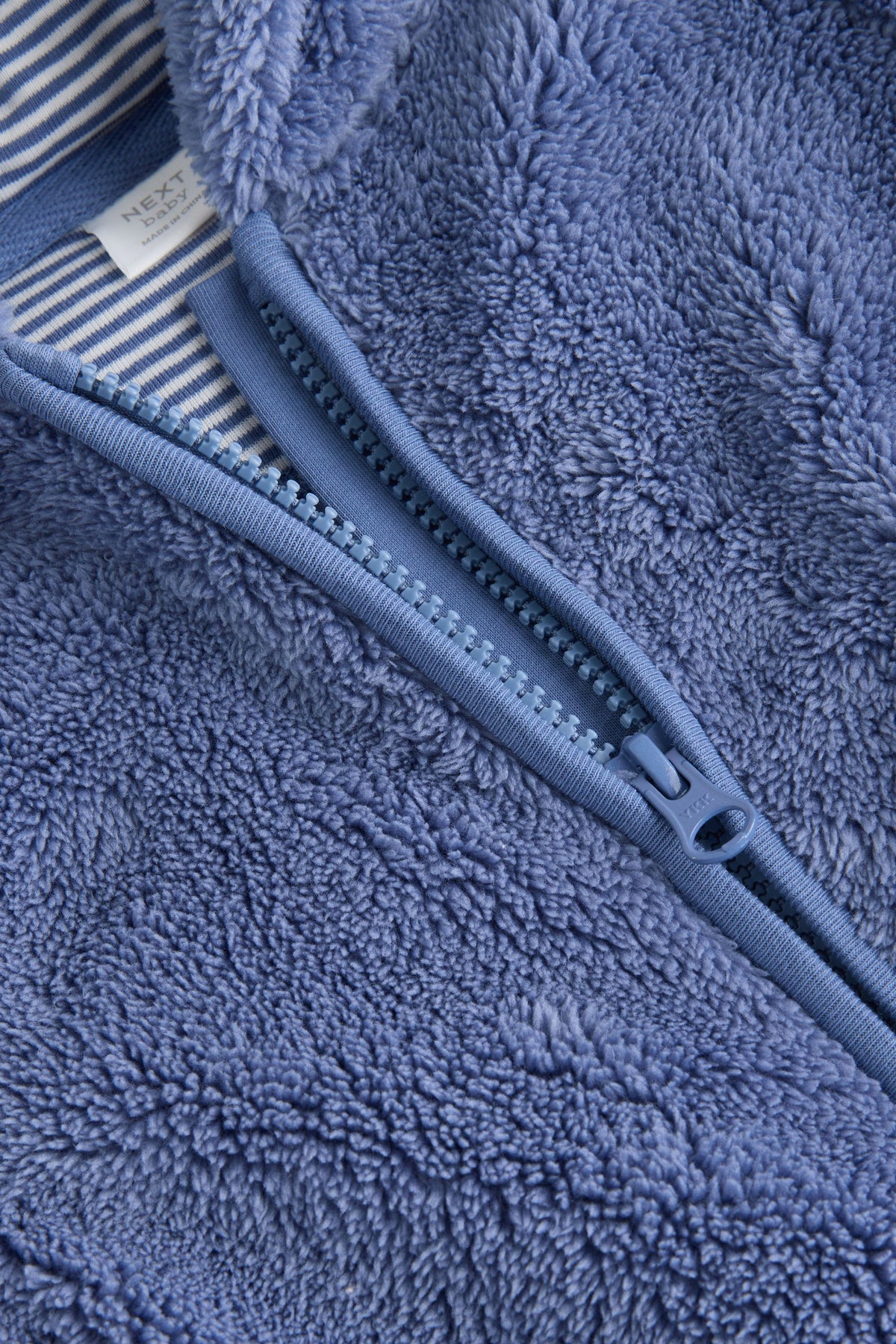 Combinezon fleece pentru bebeluși – bleumarin, NEXT