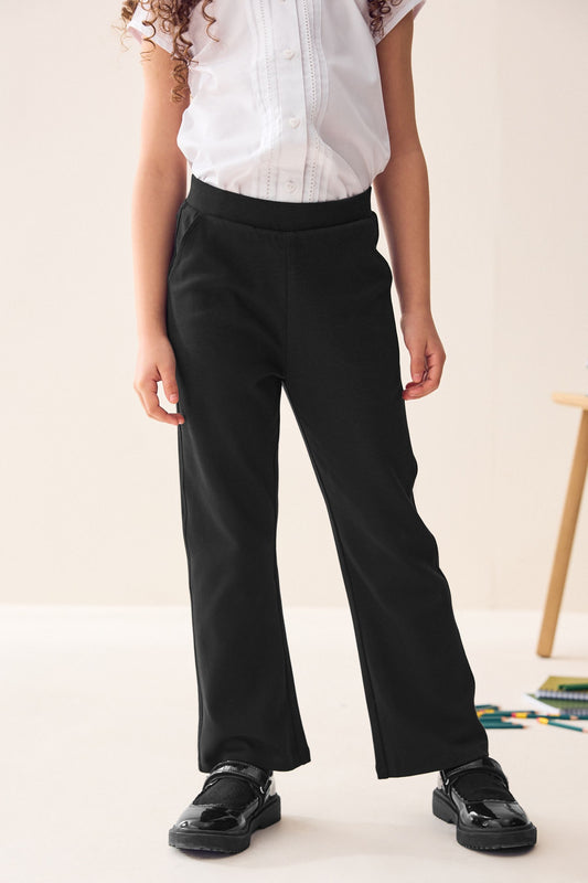 Pantaloni de școală evazați, tip pull-on, din bumbac cu stretch – negri, fete, 3 ani - 17 ani, NEXT
