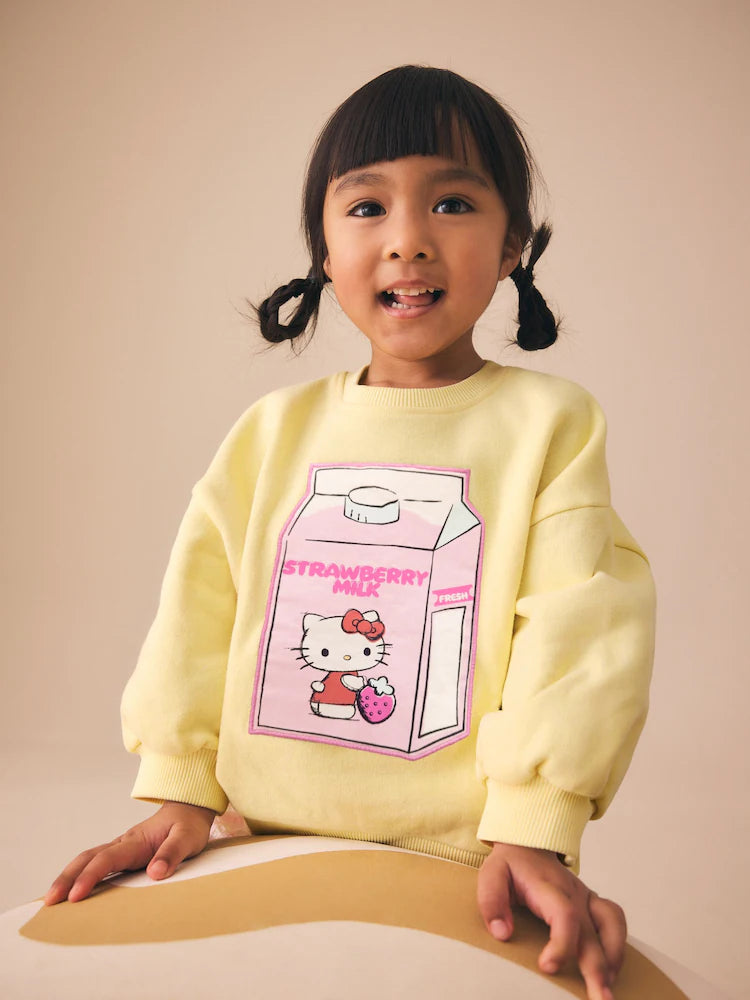 Set Hello Kitty cu bluză de trening și pantaloni scurți - galben